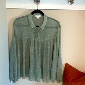 A Lauren Conrad sheer Top with sleeves